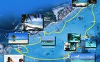 Location bateau sans permis Saint François Cool Lagoon devant les villas de luxe